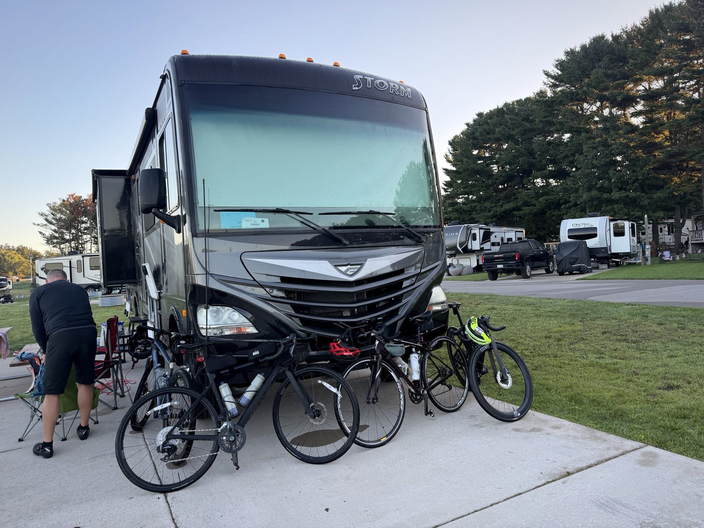 The team's bicycles lined up beside the RV at camp.